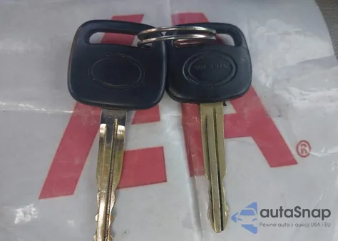 1999 Toyota Camry Le z USA, uszkodzony, nr VIN 4T1BG22K1XU406852